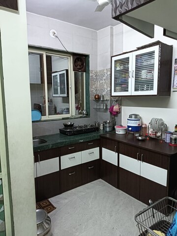 Kitchen in 1 BHK Apartment at Dombivli West – for Sale