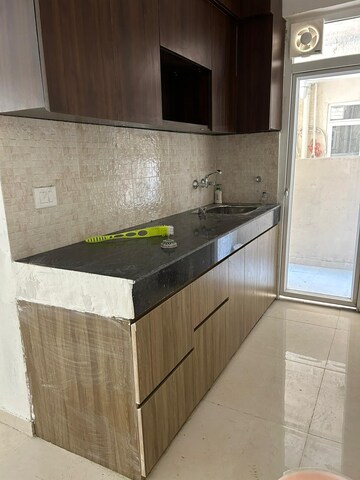 Kitchen in 2 BHK Apartment at Signature Global The Millennia, Sector 37d – for Sale