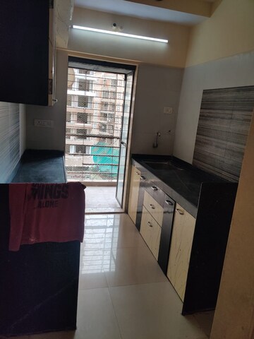 Kitchen in 2 BHK Apartment at Ravi Gaurav Excellency, Mira Road – for Sale