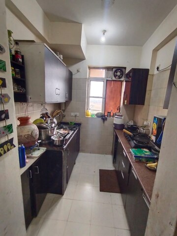 Kitchen in 2.5 BHK Apartment at Satya The Hermitage, Sector 103 – for Sale