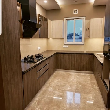 Kitchen in 3.5 BHK Apartment at DLF Hamilton Court, Sector 27 – for Sale