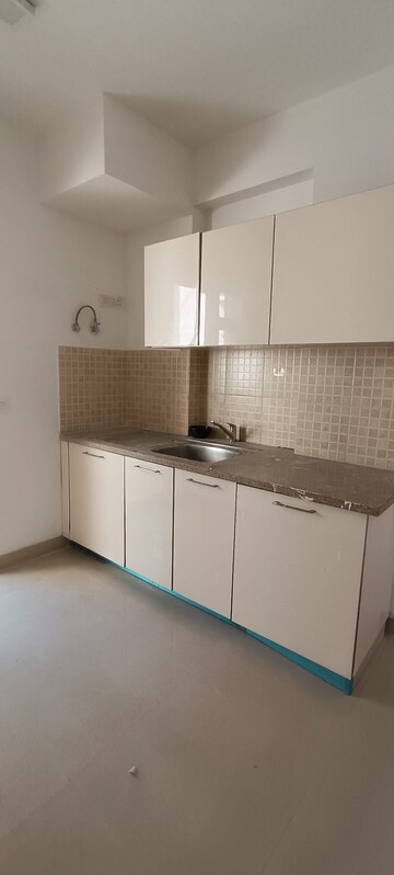 Kitchen in 3 BHK Apartment at Emaar Gurgaon Greens, Sector 102 – for Sale