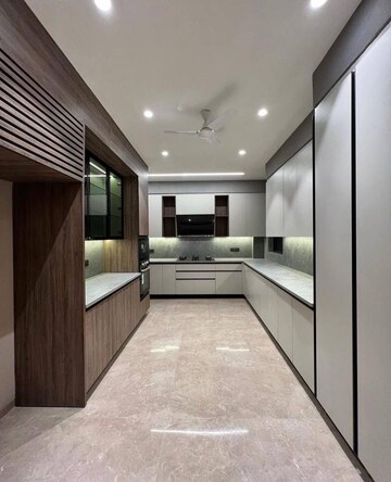 Kitchen in 4 BHK Apartment at DLF Belvedere Towers, Sector 24 – for Sale