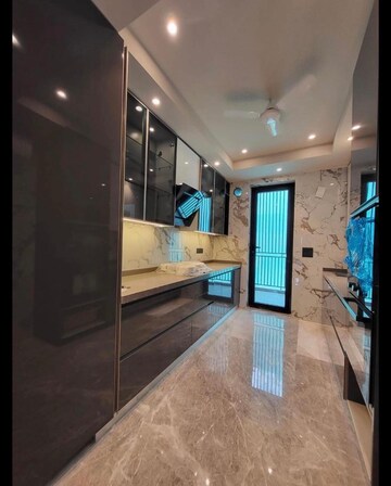 Kitchen in 4 BHK Apartment at Ambience Island Lagoon, Sector 24 – for Sale