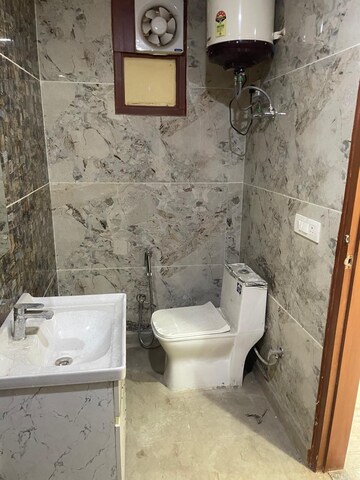 Bathroom in 2 BHK Builder Floor at Khirki Extension – for Sale