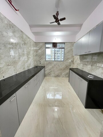 Kitchen in 1 BHK Apartment at Rajesh White City, Kandivali East – for Sale