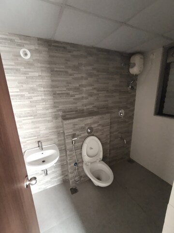 Bathroom in 1.5 BHK Apartment at Lodha Palava City Lakeshore Greens, Dombivli East – for Sale