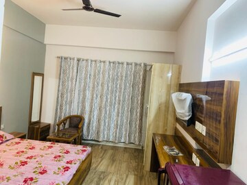 Living Room in 1 RK Apartment at Paramount Golf Forest Studio Apartments Phase 2 -, Upsidc Site C – for Rent