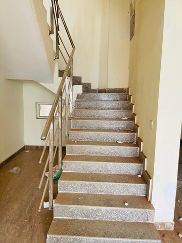 Staircase in 3 BHK Penthouse at Amrapali Princely Estate, Sector 76 – for Sale