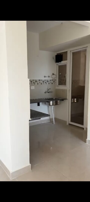 Kitchen in 2 BHK Apartment at Signature Orchard Avenue 2, Sector 93 – for Sale