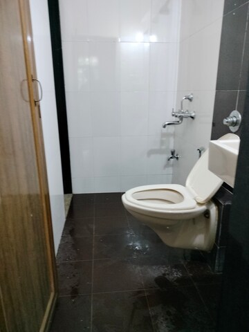 Bathroom in 1 BHK Apartment at Vihang Valley Phase 2, Kasarvadavali – for Sale