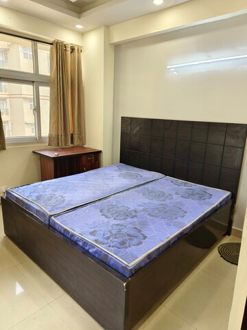 Bedroom in 2 BHK Apartment at Amrapali Princely Estate, Sector 76 – for Sale