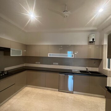 Kitchen in 4 BHK Apartment at Maya Green Lotus Utsav, International Airport Road – for Sale
