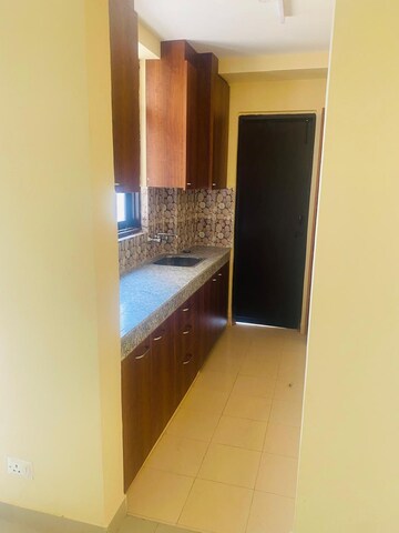 Kitchen in 2 BHK Apartment at Apex Our Homes, Sector 37c – for Sale
