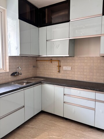 Kitchen in 2 BHK Apartment at SLF Anushree, Sector 75 – for Sale