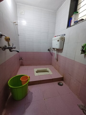 Bathroom in 2 BHK Apartment at Parsik Nagar – for Sale