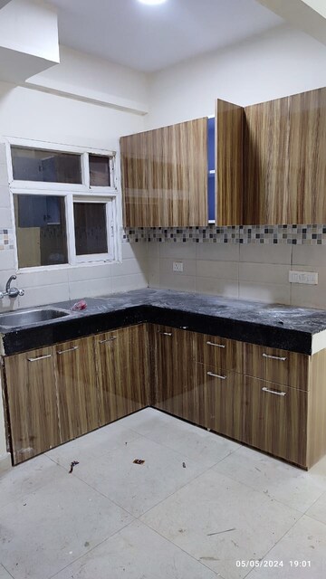 Kitchen in 2.5 BHK Apartment at Signature Global Synera, Sector 81 – for Sale