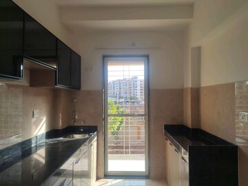 Kitchen in 1 BHK Apartment at Shellproof Gladiolus Tower, Vasai East – for Sale