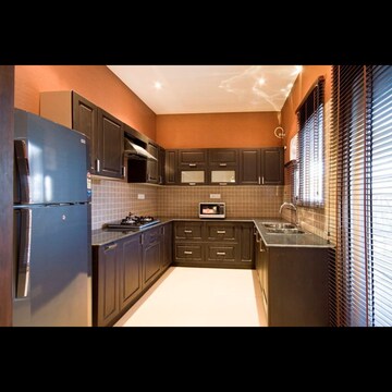 Kitchen in 3 BHK Apartment at Sushma Crescent, Dhakoli Village – for Sale