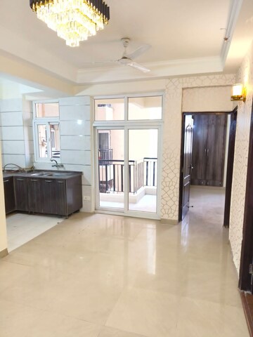 Living Room in 2.5 BHK Apartment at Amrapali Princely Estate, Sector 76 – for Sale