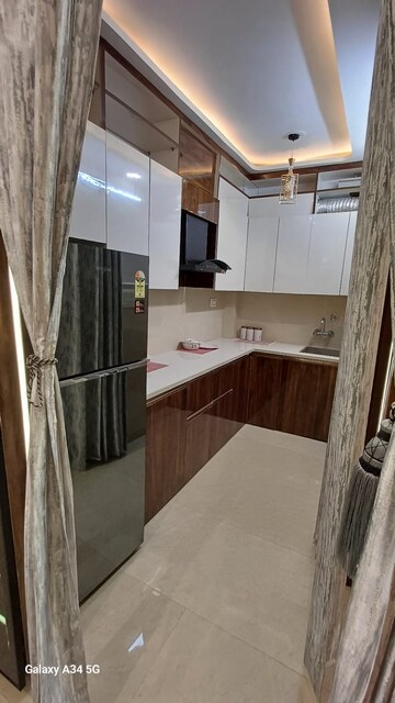 Kitchen in 3 BHK Apartment at Uttam Nagar – for Sale