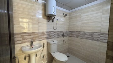 Bathroom in 2.5 BHK Apartment at Bulland Heights, Sain Vihar – for Sale