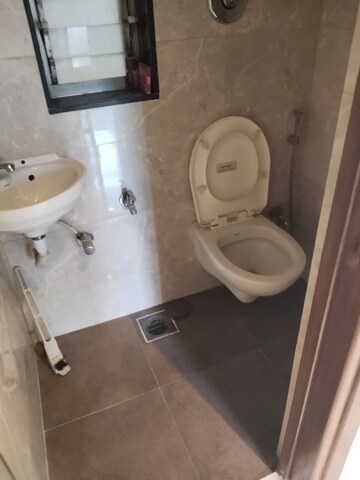 Bathroom in 2 BHK Apartment at Pr Woodwind, Andheri East – for Sale