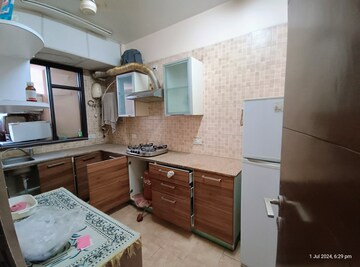 Kitchen in 2 BHK Apartment at Eros Kenwood Tower, Charmwood Village – for Sale