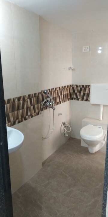 Bathroom in 2 BHK Apartment at Rustomjee Global City, Virar West – for Sale