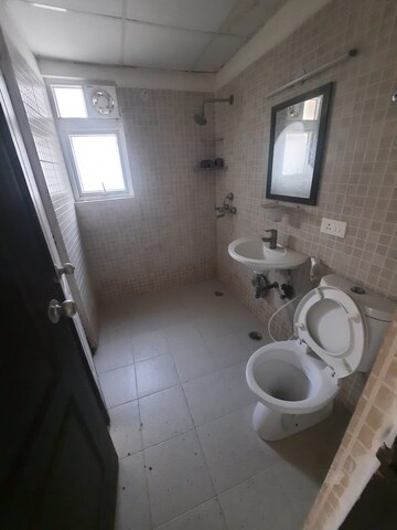 Bathroom in 2 BHK Apartment at Aditya Urban Casa, Sector 78 – for Sale
