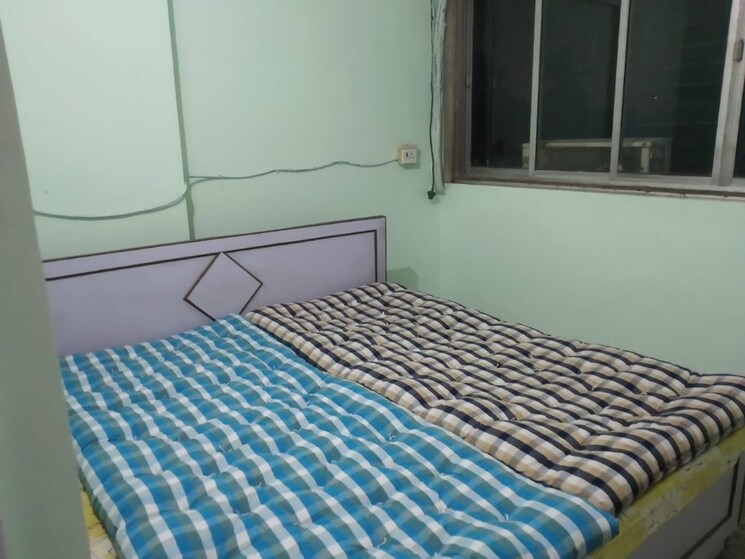 Bedroom, uttam-chs-kopri 2 Bedroom 710 Sq.Ft. Apartment In Kopri Thane 7010880