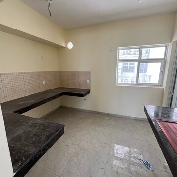 Kitchen in 3.5 BHK Apartment at Experion Capital, Vibhuti Khand – for Sale