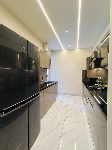 Kitchen in 3 BHK Apartment at Aura Gazania, High Ground – for Sale