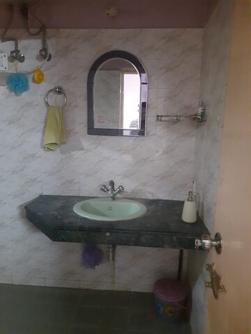 Bathroom in 4 BHK Apartment at DLF The Belvedere Park, Sector 24 – for Sale