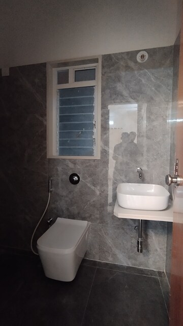 Bathroom in 2 BHK Apartment at Triveni Pearl, Khadakpada – for Sale
