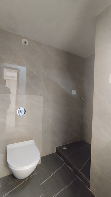 Bathroom in 2 BHK Apartment at Triveni Pearl, Khadakpada – for Sale