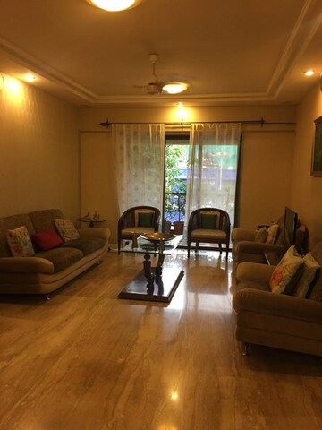 Living Room in 4 BHK Apartment at Ekta Heights Khar West, Khar West – for Sale