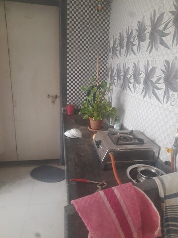 Kitchen in 1 BHK Apartment at Naupada – for Sale
