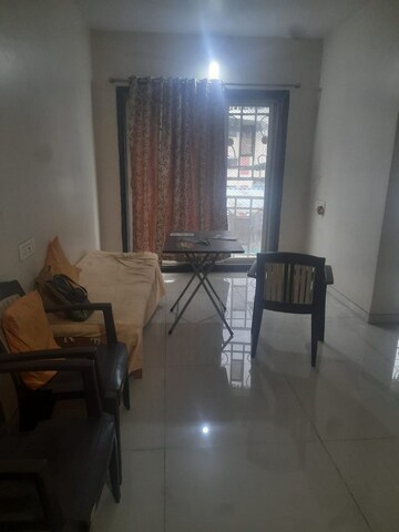 Living Room in 1 BHK Apartment at Naupada – for Sale