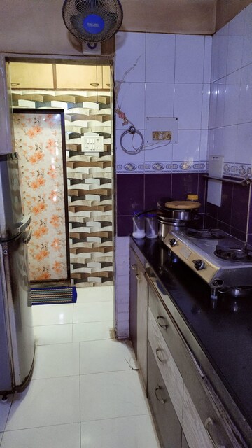 Kitchen in 1 BHK Apartment at Kshitij CHS, Goregaon East – for Sale