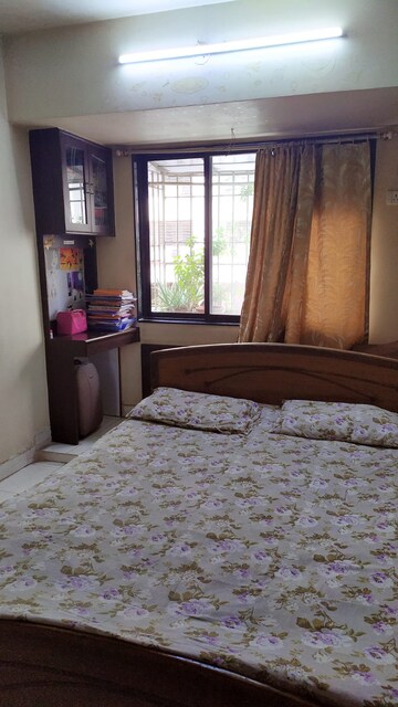 Bedroom in 1 BHK Apartment at Kshitij CHS, Goregaon East – for Sale