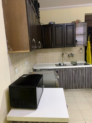 Kitchen in 4 BHK Apartment at Unitech The World Spa, Sector 30 – for Sale