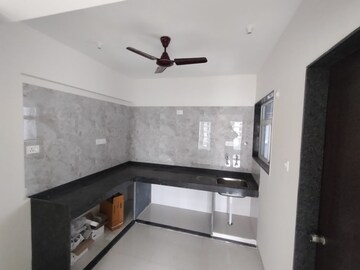 Kitchen in 2 BHK Apartment at Gini Belvista Phase 1, Dhanori – for Sale