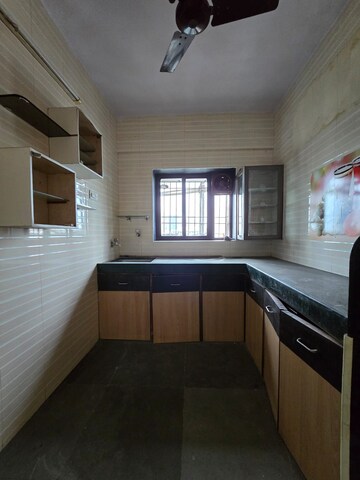Kitchen in 1 BHK Apartment at Parsik Nagar – for Sale