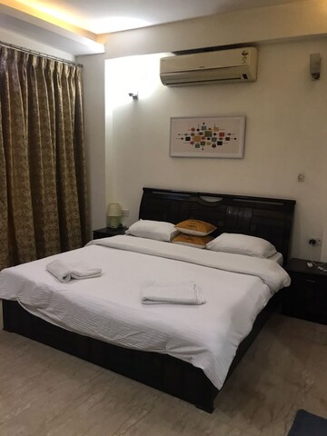 Bedroom in 3.5 BHK Builder Floor at Panchsheel Enclave – for Sale