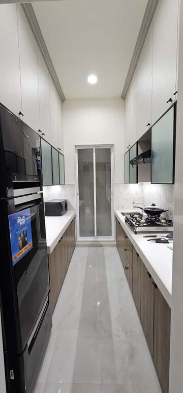 Kitchen in 2 BHK Apartment at Dosti West County, Balkum Pada – for Sale