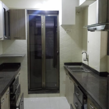 Kitchen in 1 BHK Apartment at DV Shree Shashwat, Gaurav Tal Patriwala Industrial Area – for Sale