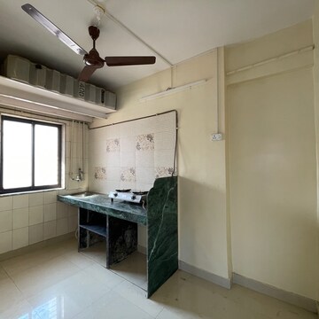 Kitchen in 1 BHK Apartment at Shiv Darshan CHS Borivali, Konkani Pada – for Sale