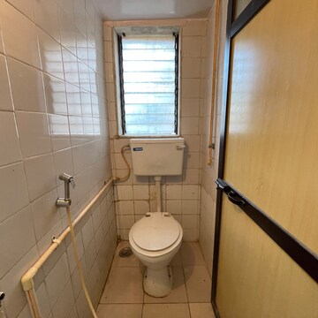 Bathroom in 1 BHK Apartment at Shiv Darshan CHS Borivali, Konkani Pada – for Sale