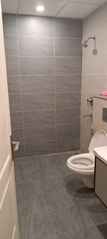 Bathroom in 4 BHK Builder Floor at BPTP Parkland Pride, Sector 77 – for Sale